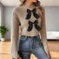Bow embellished flared sleeve short sweater